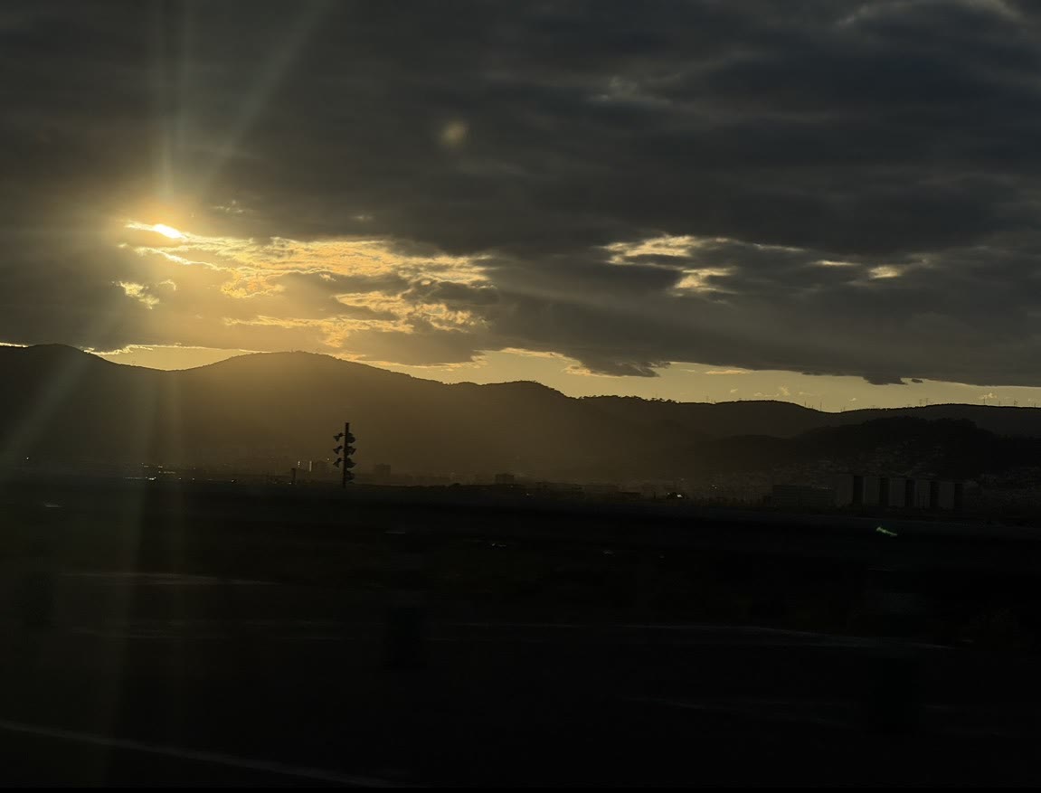 Evening sky above distant mountains